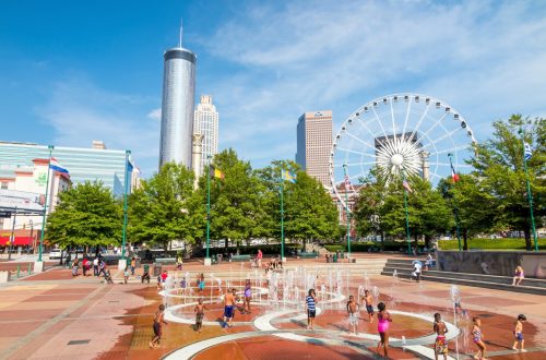 ATLANTA - AUGUST 5: Children play at Centennial Olympic Park August 5, 2014 in Atlanta, GA. The park commemorates the 1996 Atlanta Olympics.